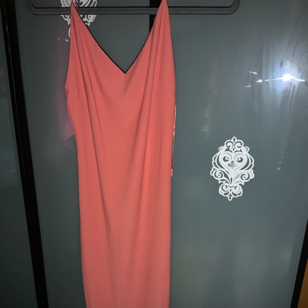 Cute simple orangish dress with V neck